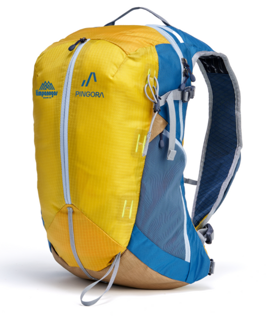 Timpanogos X Pingora backpack in vibrant yellow and blue with a tan base, designed for day hikes and outdoor adventures with adjustable straps and ample storage