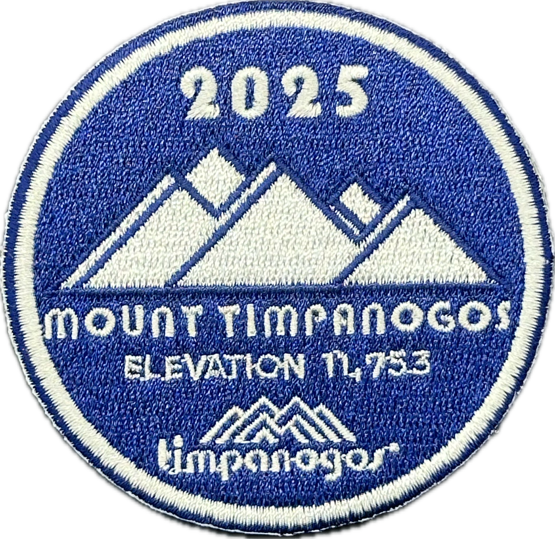2025 Timpanogos "Mount Timpanogos" patch in blue and white, showcasing the mountain design with "Mount Timpanogos" at an elevation of 11,753 feet, along with the Timpanogos Hiking Co. logo at the bottom.