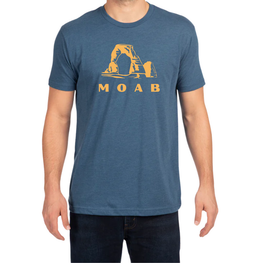 Heather blue Moab t-shirt featuring a golden silhouette of Delicate Arch and bold MOAB lettering — a soft, unisex tee celebrating Utah’s iconic red rock landscapes and desert adventures.