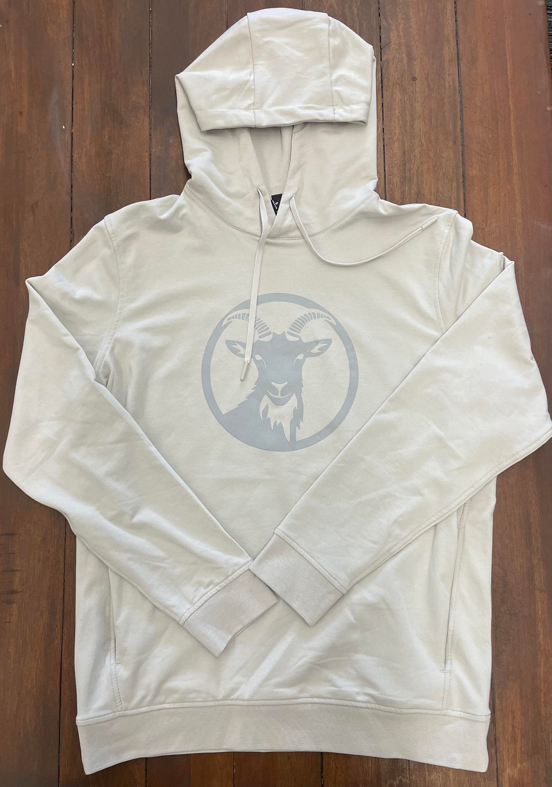 Casual Heather Cream sweatshirt with a soft gray goat logo in a circular design, ideal for staying cozy after a hike or adventure