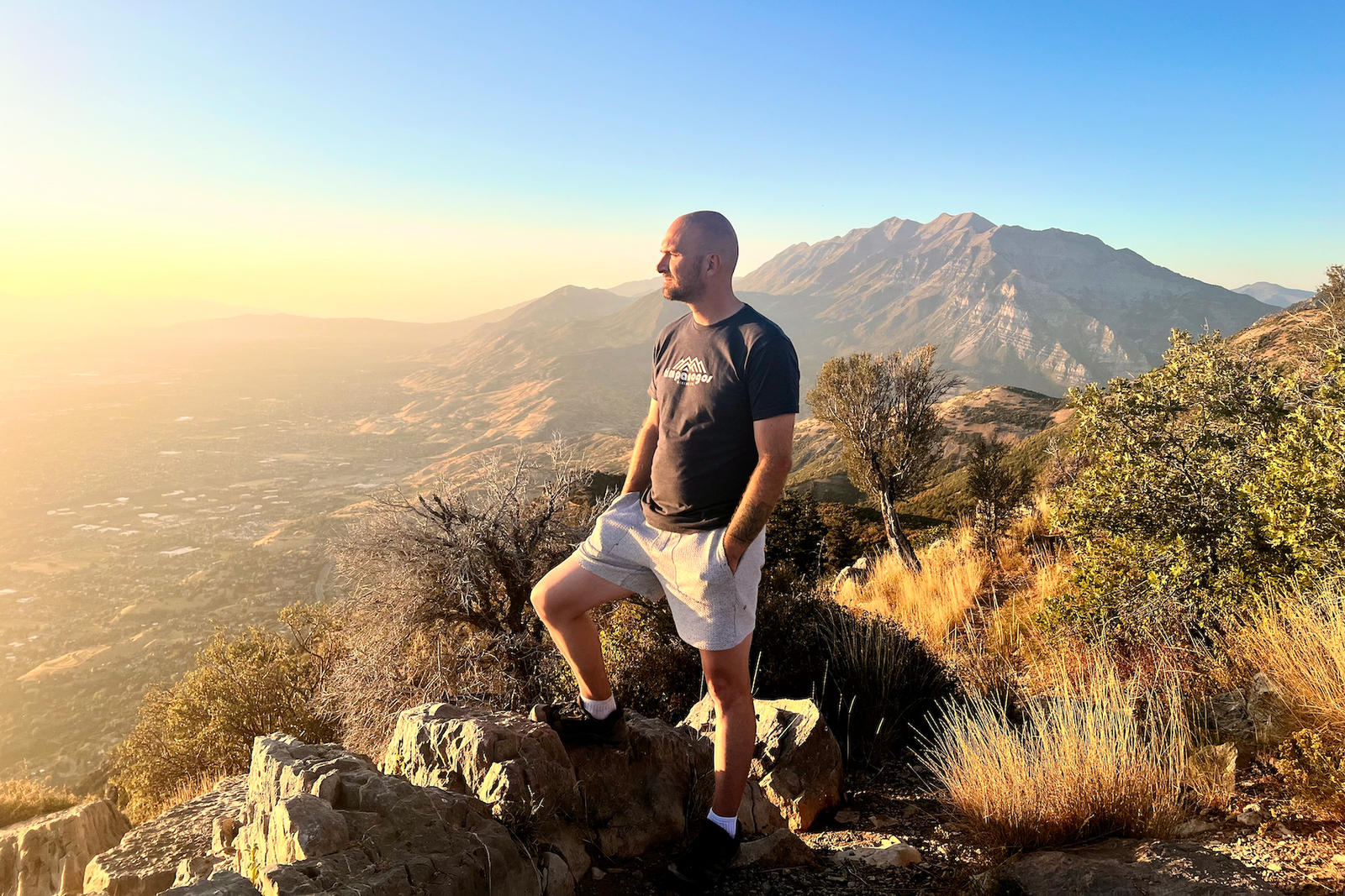 Timpanogos founder Joe Vogel standing on a mountain with Mount Timpanogos in the background