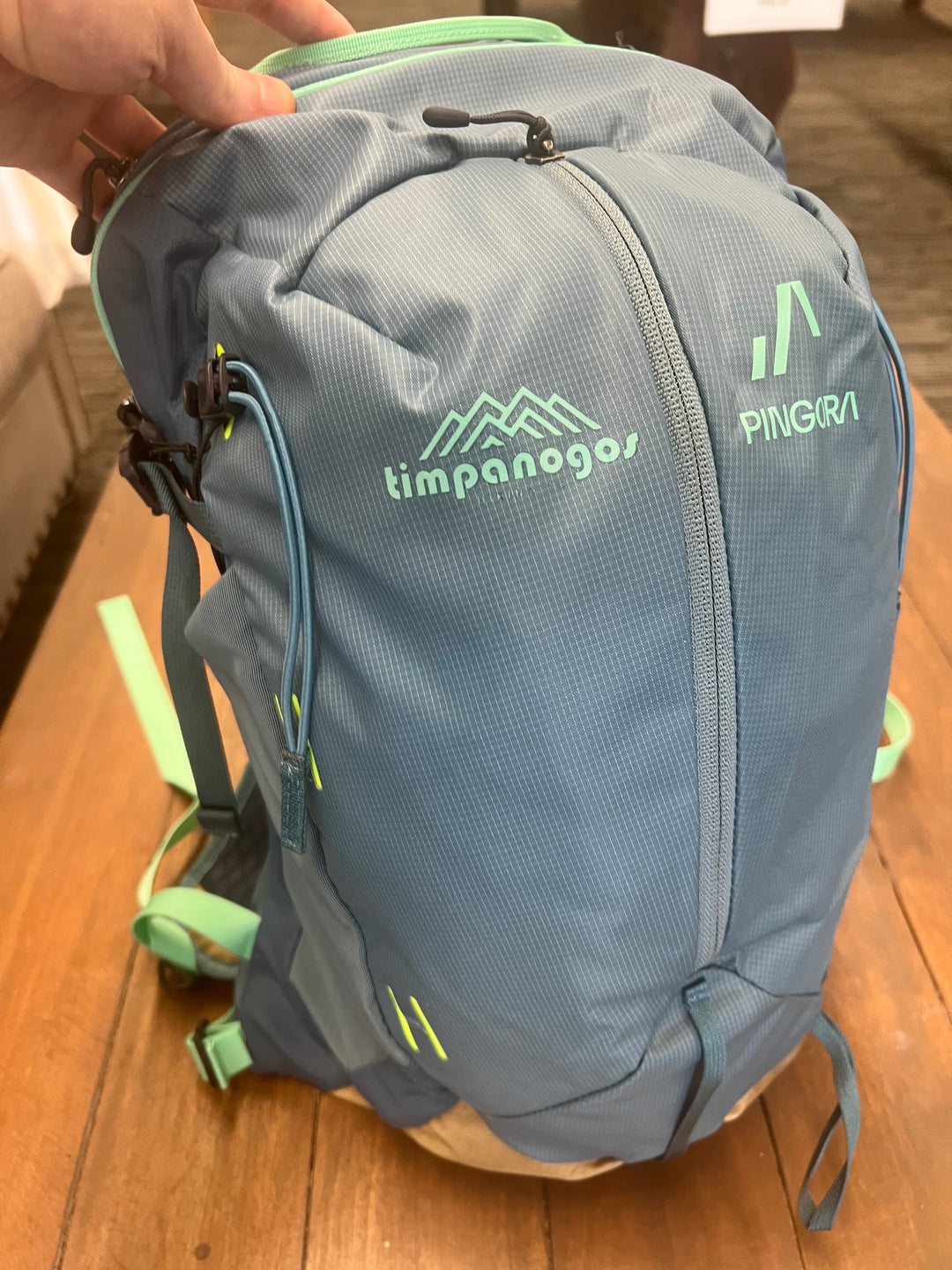 Blue and mint green Pingora x Timpanogos Hiking Co. technical daypack, ultralight hiking backpack designed for alpine adventures and rugged trails.