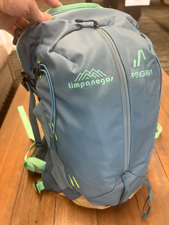 Blue and mint green Pingora x Timpanogos Hiking Co. technical daypack, ultralight hiking backpack designed for alpine adventures and rugged trails.