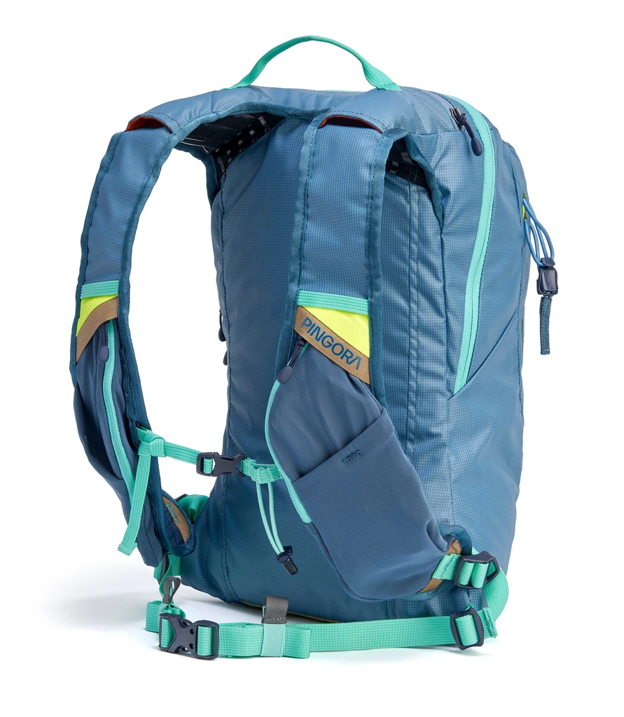 light blue Timpanogos x Pingora technical backpack with neon yellow accents and padded shoulder straps, designed for alpine trekking, backcountry performance, and all-day trail comfort.